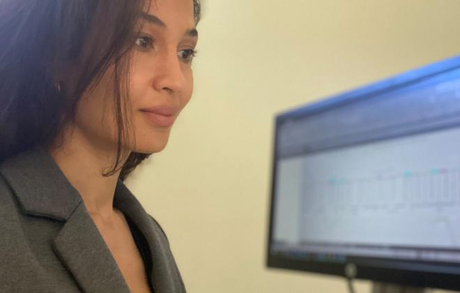 Woman working at computer screen