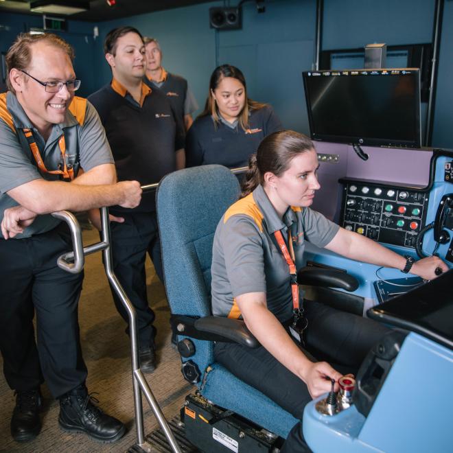 Trainer and students using virtual reality