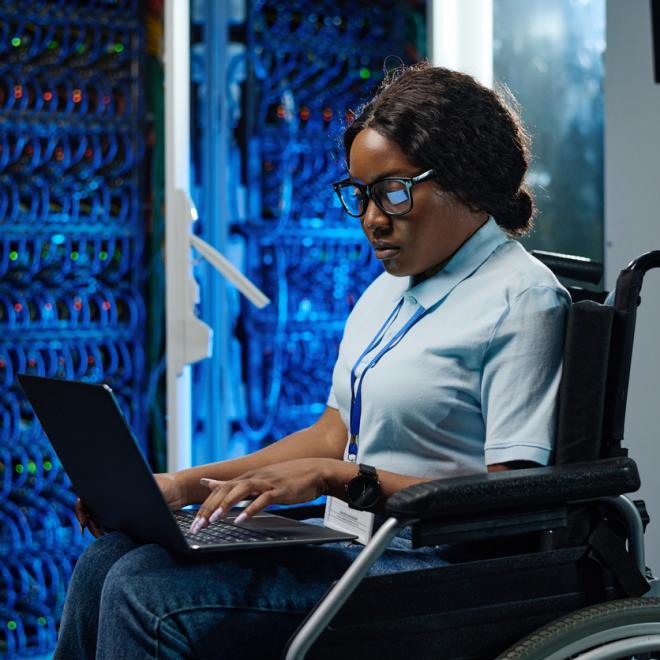 Female telecommunications technician checking power board.